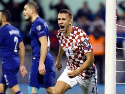 Ivan Perisic celebra el tercer gol del combinado croata.  AFP/STRINGER