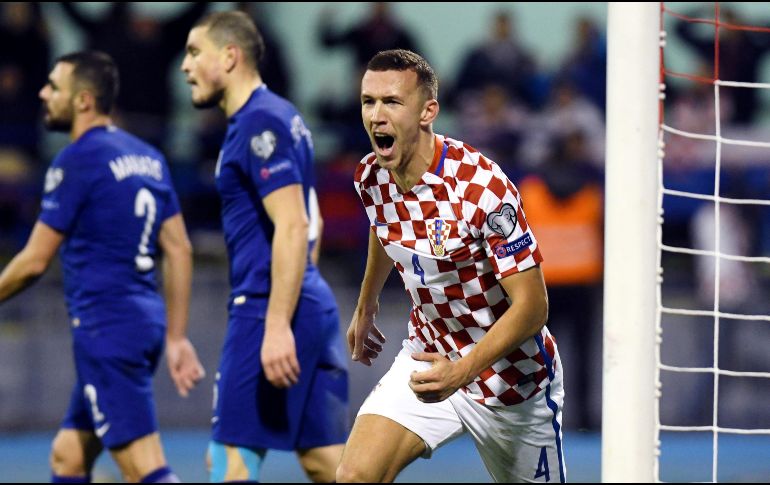 Ivan Perisic celebra el tercer gol del combinado croata.  AFP/STRINGER