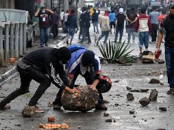 Luego de los comicios se generó una ola de protestas violentas que han dejado más de 17 muertos, 50 lesionados y casi dos mil detenidos. AFP / O. Sierra