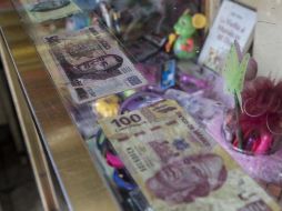 En un domicilio de Nuevo León se encontraron decenas de billetes de 100 y 200 pesos falsos, presuntamente fabricados ahí mismo. EL INFORMADOR / ARCHIVO