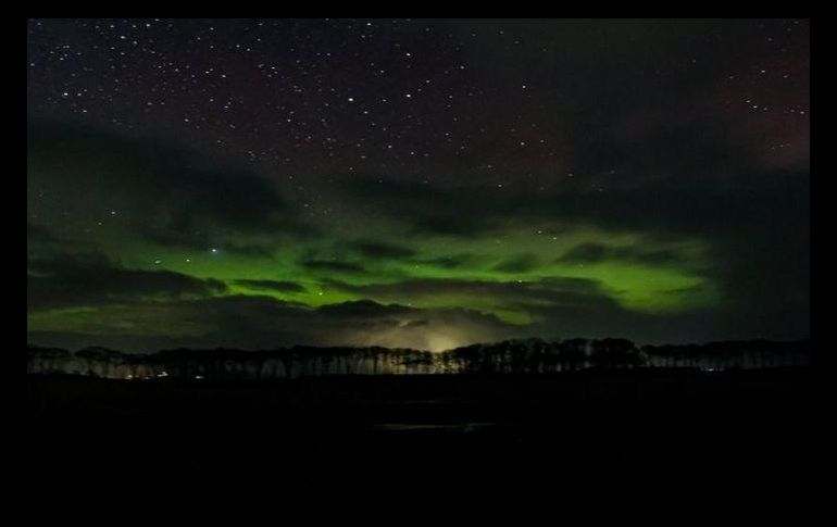 El destello verde de la aurora visto desde Portmahomack, en las Tierras Altas. STU THE PLASTERER/BBC WEATHER WATCHERS