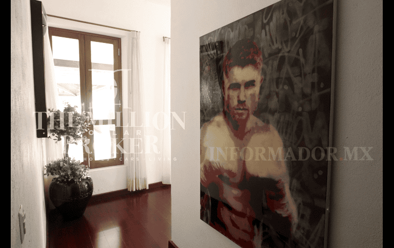 Este cuadro del boxeador se encuentra en uno de los pasillos del interior de la casa. EL INFORMADOR/ A. Camacho
