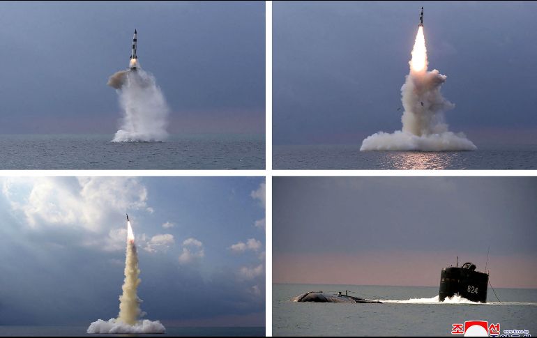 Imágenes publicadas por medios mostraron al misil blanco y negro emergiendo del agua con un submarino en la superficie. AFP/KCNA