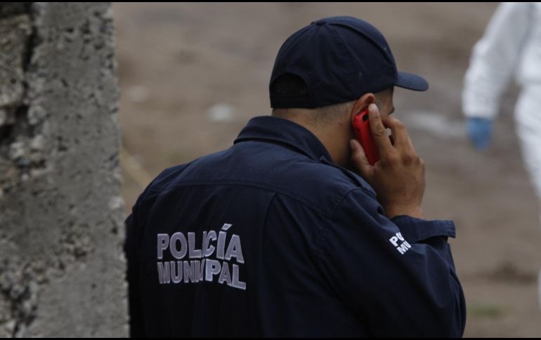 Oficiales de la Comisaría de Tlajomulco localizaron en un lote baldío a un hombre muerto. EL INFORMADOR/ARCHIVO