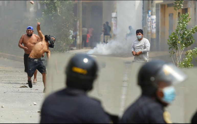 Las protestas han dejado tres muertos y una veintena de detenidos. AFP/G. Masko