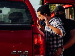 En junio de 2020, elementos de la Fiscalía de Jalisco vestidos de civiles subieron a camionetas sin logos a jóvenes que se manifestaban pacíficamente y los privaron de la libertad. EL INFORMADOR/ ARCHIVO