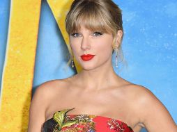 Sin duda el labial color rojo es el sello personal de celebridades como Taylor Swift o Dakota Johnson. AFP/ Angela Weiss