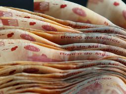 El peso mexicano se mantiene a la espera de la decisión de las autoridades monetarias sobre el aumento en 75 puntos base de la principal tasa de interés del país. EL INFORMADOR / ARCHIVO