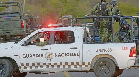 El operativo dejó un elemento de la Guardia Nacional muerto, uno herido y tres presuntos delincuentes detenidos. AFP