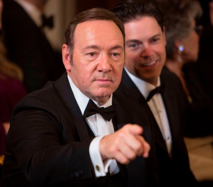 (FILES) In this file photo taken on December 4, 2016, actor Kevin Spacey acknowledges another guest during a reception for the 2016 Kennedy Center Honorees at the White House in Washington, DC. Prosecutors dropped sexual assault proceedings against Spacey on July 17, 2019, after the case against the Hollywood star collapsed over his alleged victim's refusal to testify. William Little had accused the 59-year-old actor of groping him in a bar on the resort island of Nantucket in July 2016. But Massachusetts prosecutors filed a formal notice of abandonment of indecent assault and battery charges due to 